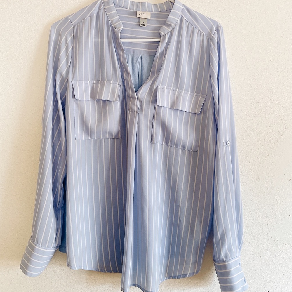 A new day Baby blue blouse.